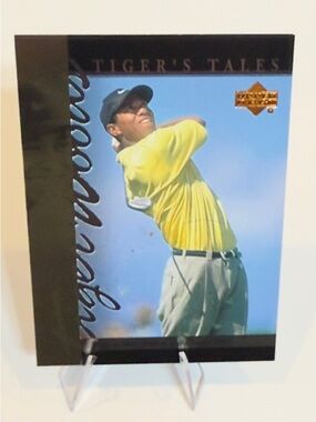 2001 Upper deck # TT 16 Tiger Woods 'Tiger's Tales' Golf Card - Yellow Shirt